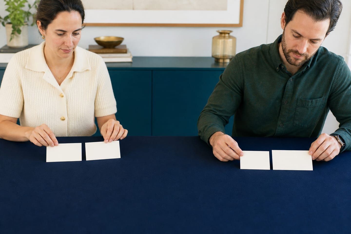Two people place separate birth-date cards beside an event interval, showing age gap and date duration as different comparisons.
